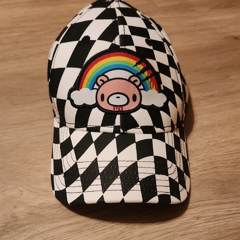 Spencer's Black and White Checkered Hat with Rainbow Bear